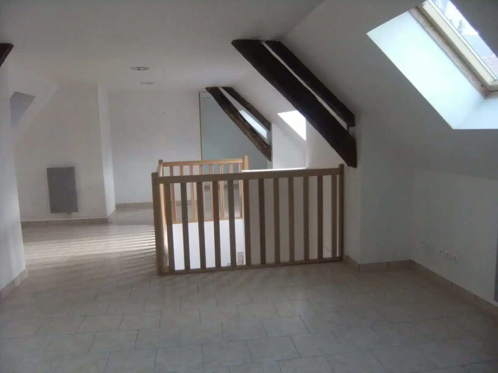 130 Immeuble de 4 lots – 3 T2 et 1 local commercial