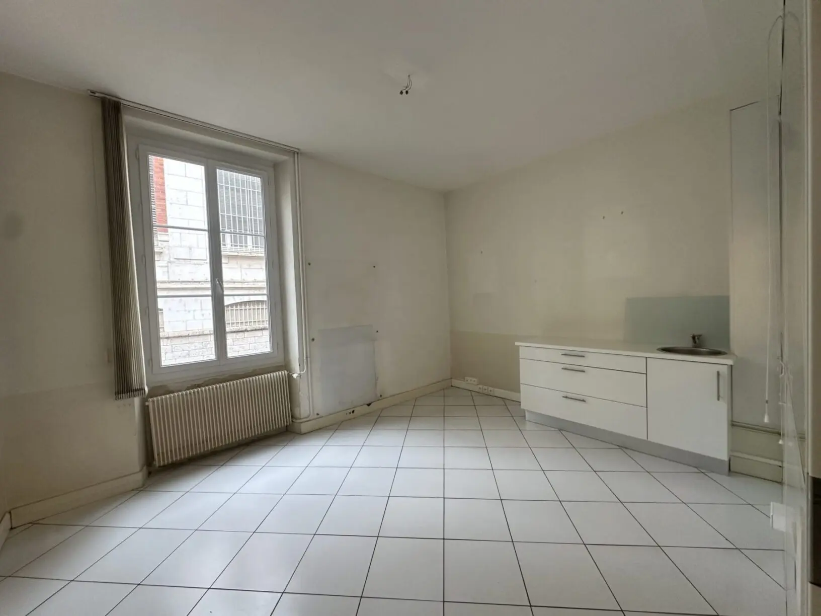 140 Immeuble de 4 lots – 3 T2 et 1 local commercial