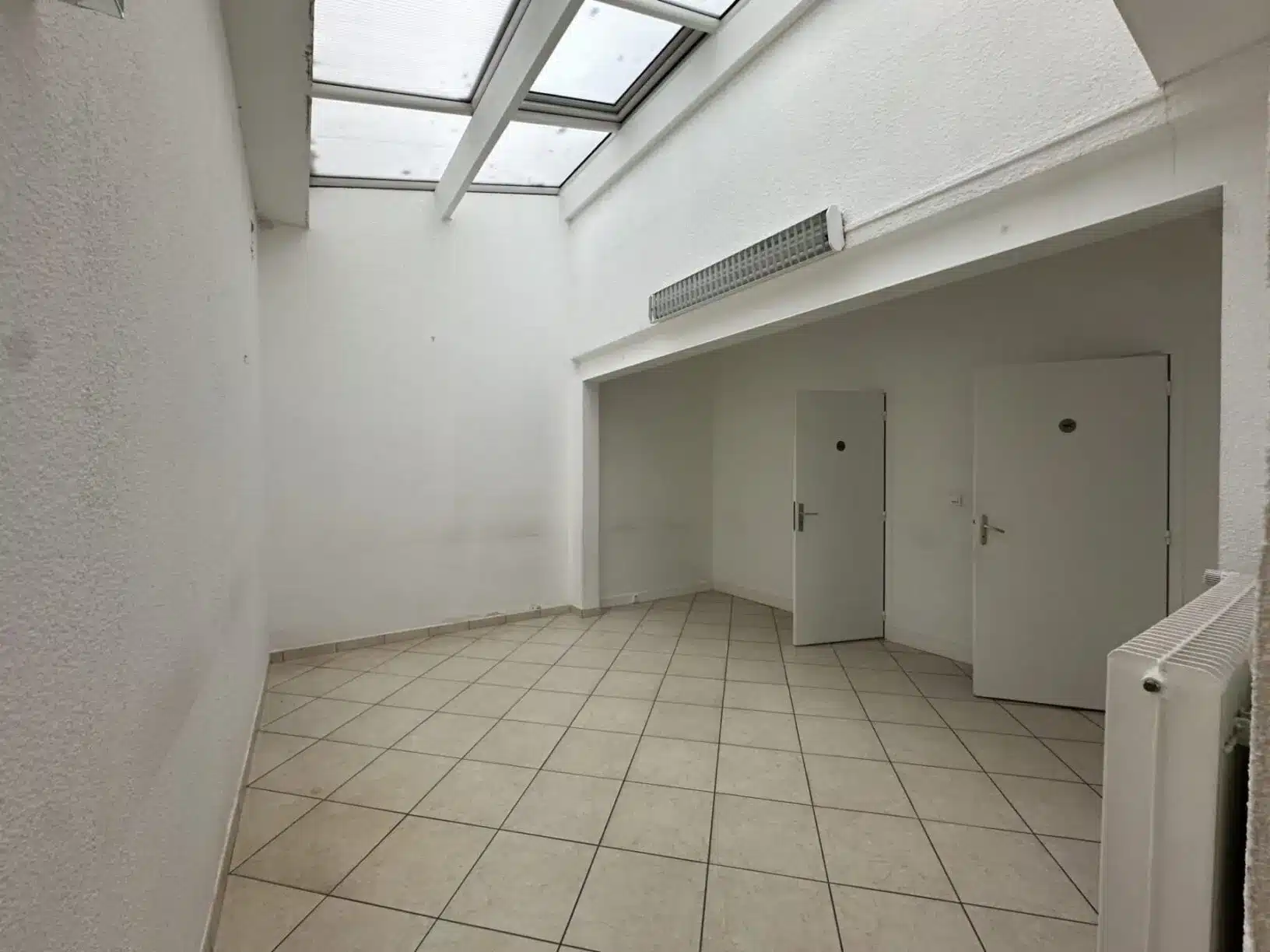 141 Immeuble de 4 lots – 3 T2 et 1 local commercial